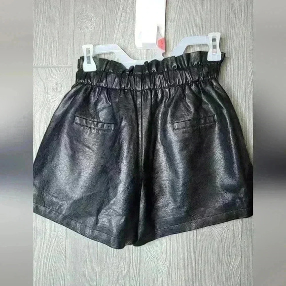 Faux leather high waisted shorts with elastic waist band size small fits a 4-6. - Picture 3 of 4